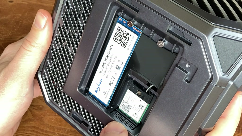 M.2 storage slots and Wi-Fi module bay inside the Tank 03