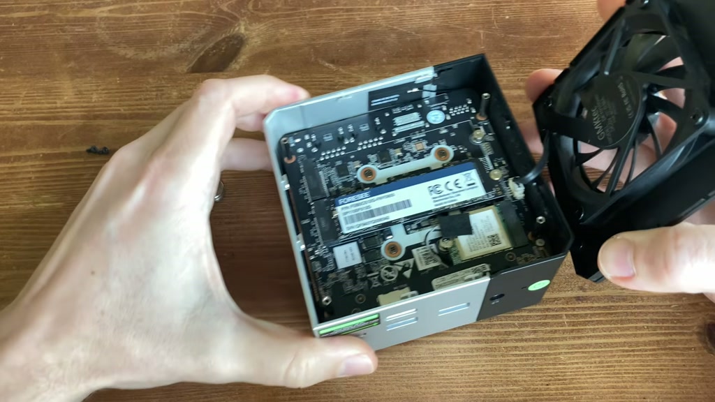 Inside the GMKtec K16 showing Wi-Fi module and NVMe storage slots